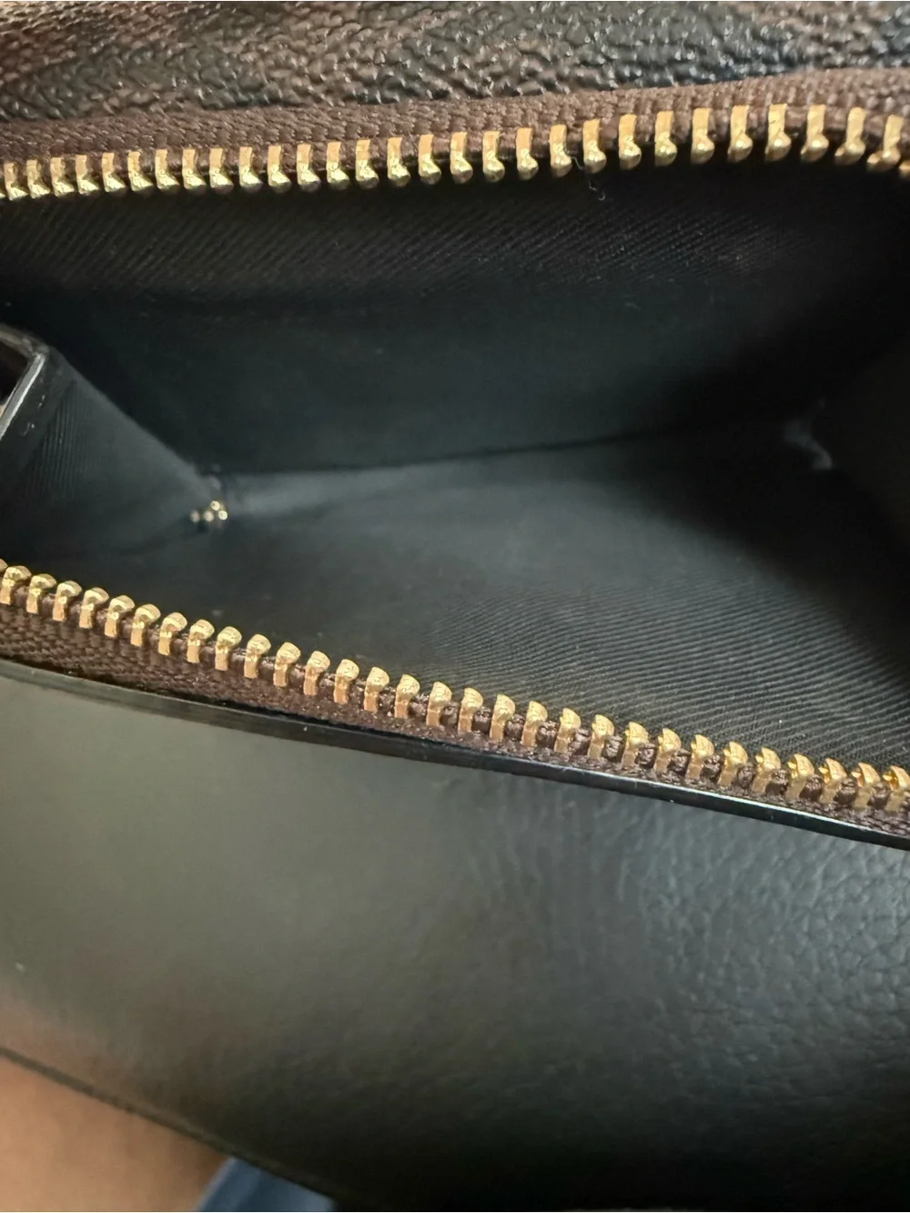 Coach Small Trifold Wallet crafted in Signature coated canvas